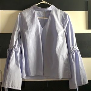 Light blue top